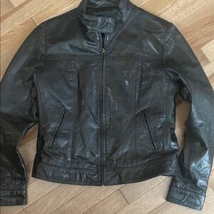 Black Leather Motorcycle Jacket with Stand-Up Collar and Textured Finish